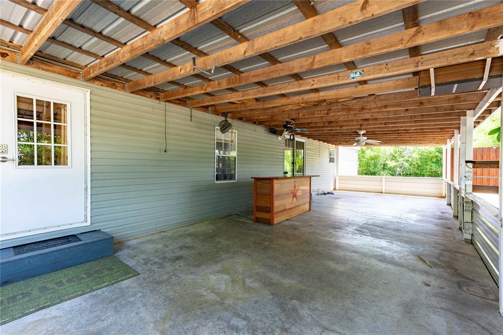 3319 Fox Ridge Boulevard Wesley Chapel, FL 33543 - Photo 38 of 50 a view of a backyard of a house