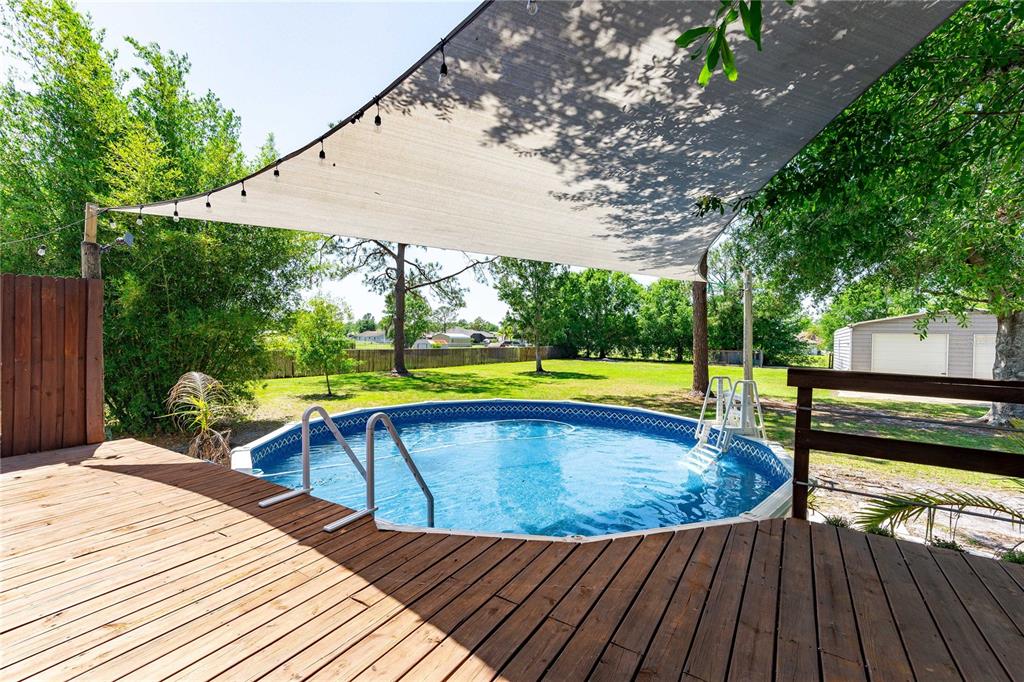 3319 Fox Ridge Boulevard Wesley Chapel, FL 33543 - Photo 40 of 50 a view of swimming pool with a patio