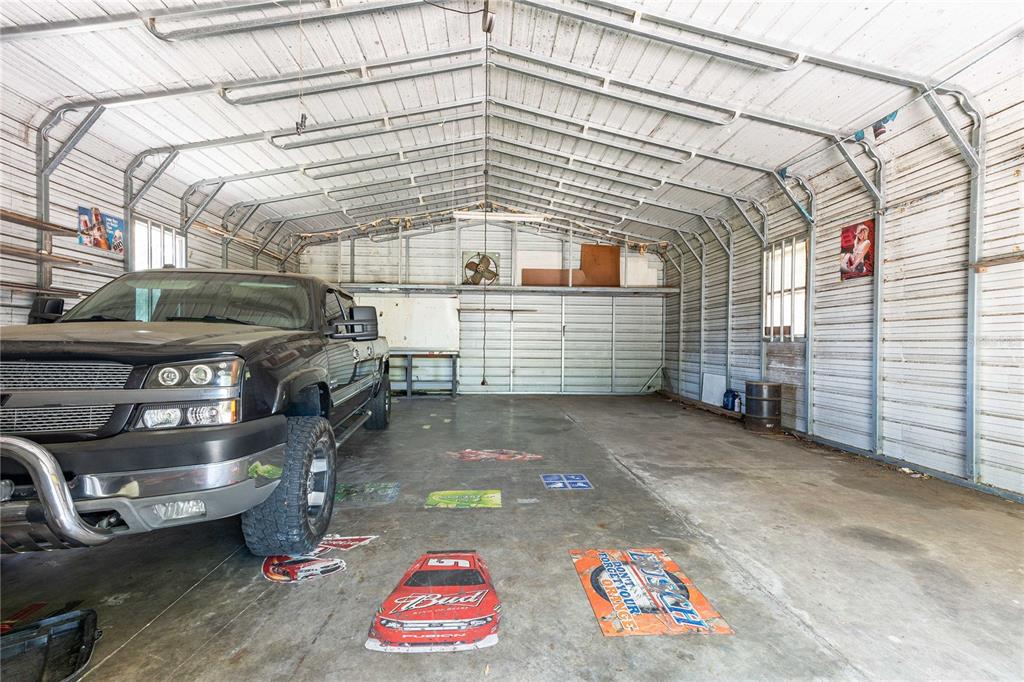 3319 Fox Ridge Boulevard Wesley Chapel, FL 33543 - Photo 45 of 50 a front view of a building with garage