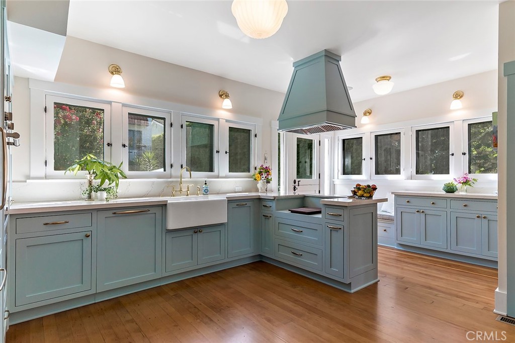 3216 2nd Street Long Beach, CA 90803 - Photo 19 of 62 a kitchen with sink cabinets and wooden floor
