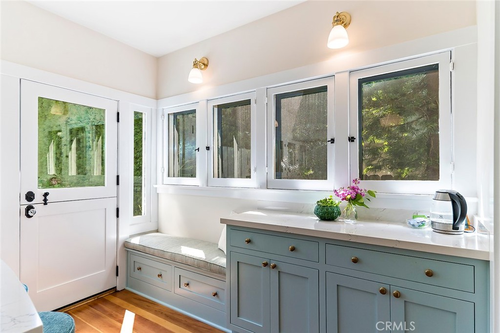 3216 2nd Street Long Beach, CA 90803 - Photo 23 of 62 a bathroom with a granite countertop sink mirror and window