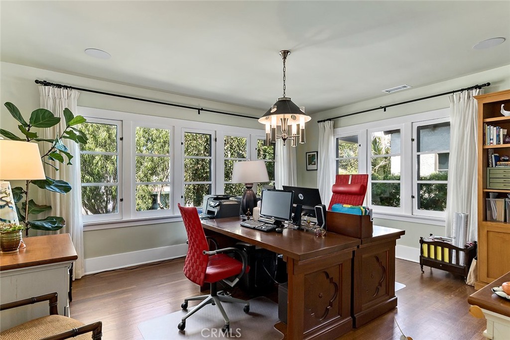 3216 2nd Street Long Beach, CA 90803 - Photo 29 of 62 a view of a workspace with furniture and a window