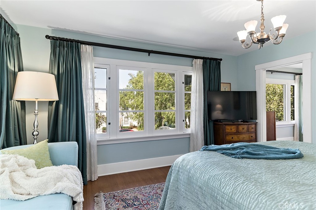 3216 2nd Street Long Beach, CA 90803 - Photo 36 of 62 a bedroom with a bed and a flat screen tv