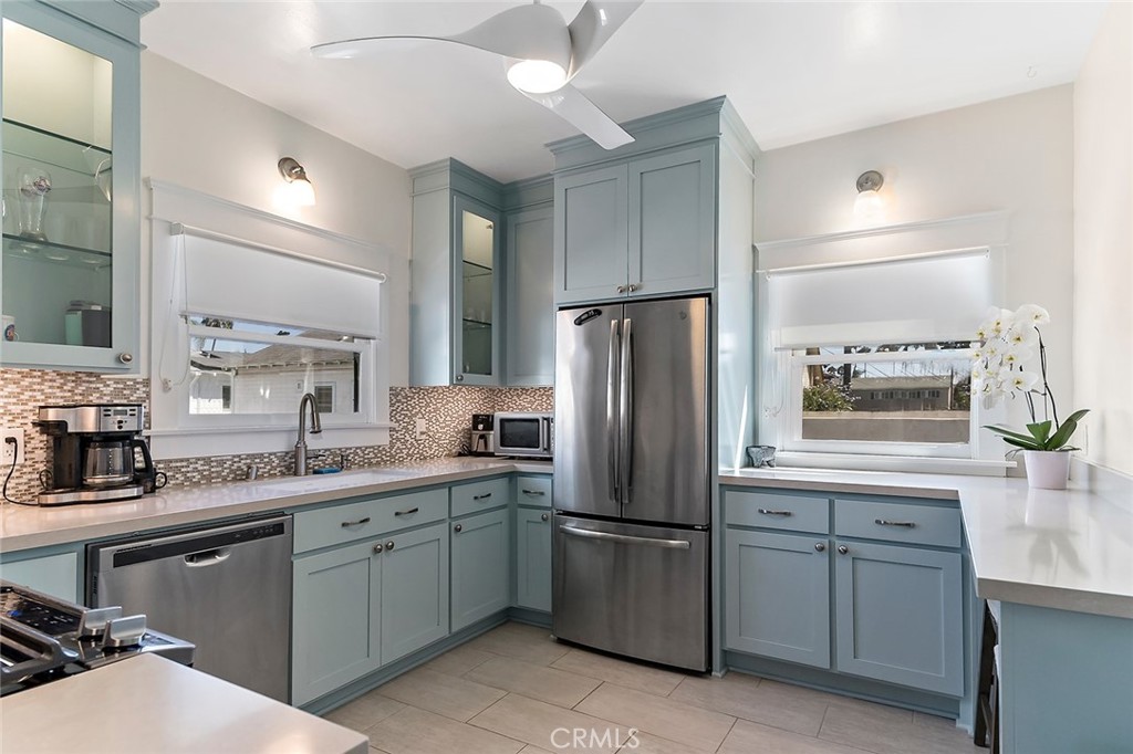 3216 2nd Street Long Beach, CA 90803 - Photo 49 of 62 a kitchen with a refrigerator sink and stove