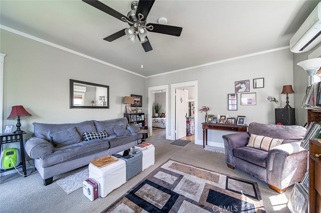3216 2nd Street Long Beach, CA 90803 - Photo 52 of 62 a living room with furniture and a wooden floor