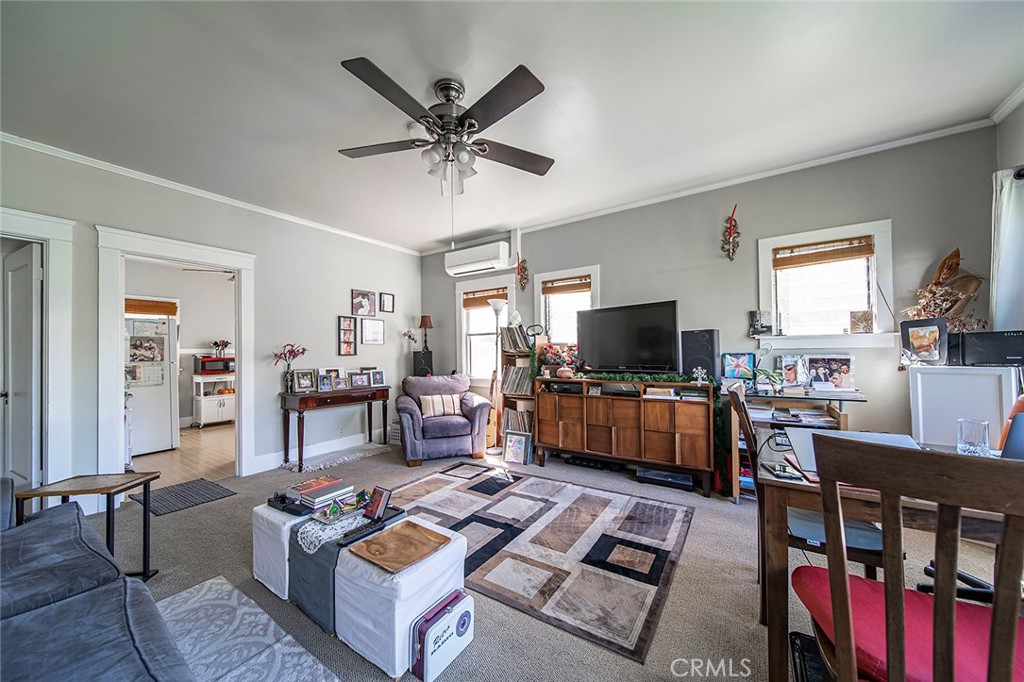 3216 2nd Street Long Beach, CA 90803 - Photo 53 of 62 a living room with furniture and a flat screen tv