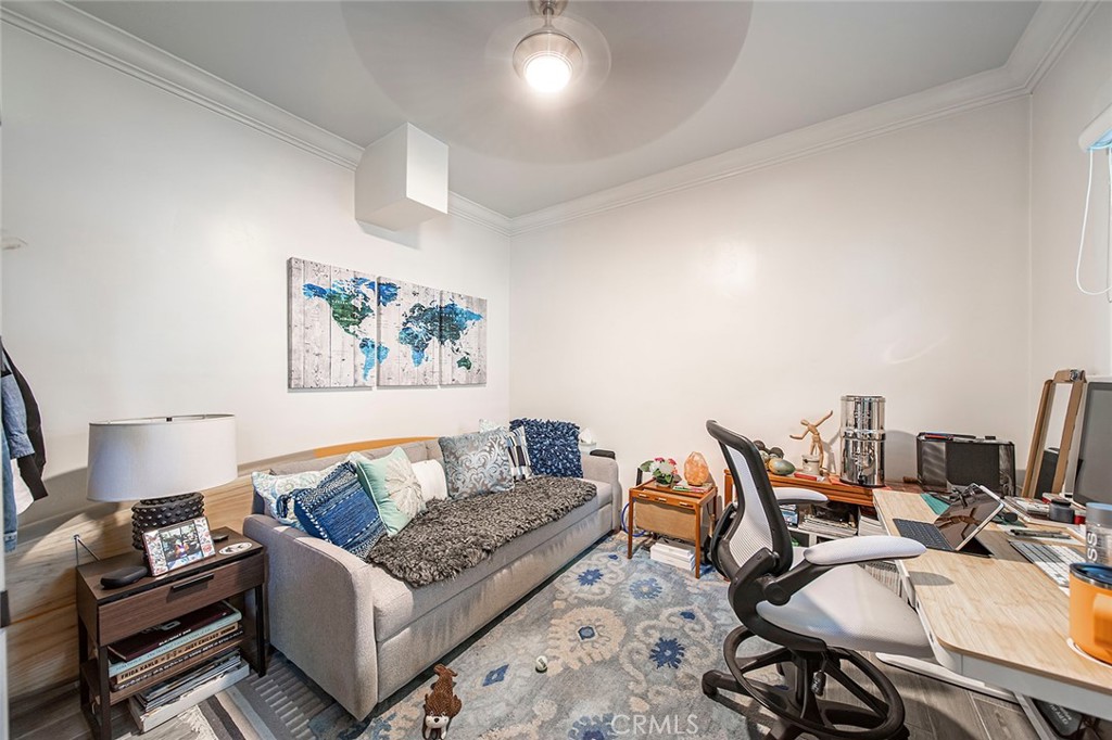 3216 2nd Street Long Beach, CA 90803 - Photo 57 of 62 a living room with furniture and a flat screen tv