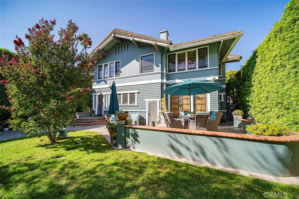 3216 2nd Street Long Beach, CA 90803 - Photo 58 of 62 a view of a house with pool and chairs