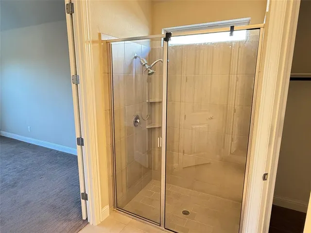 a view of an empty walk in closet