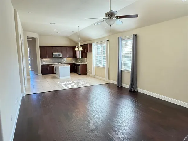a view of a bathroom from a corridor