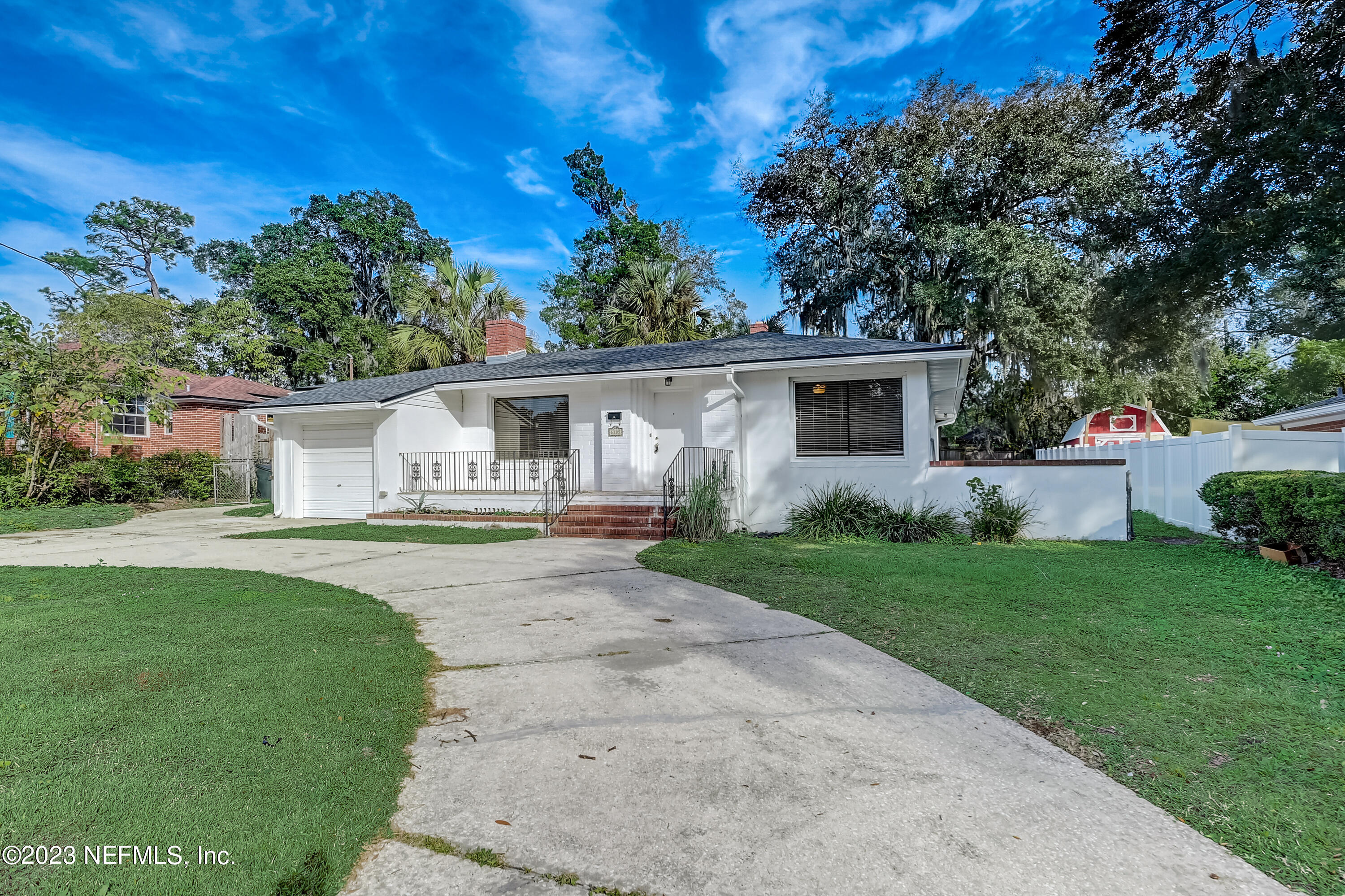 6105 Duke Road Jacksonville, FL 32217 - Photo 1 of 29 front view of a house with a yard