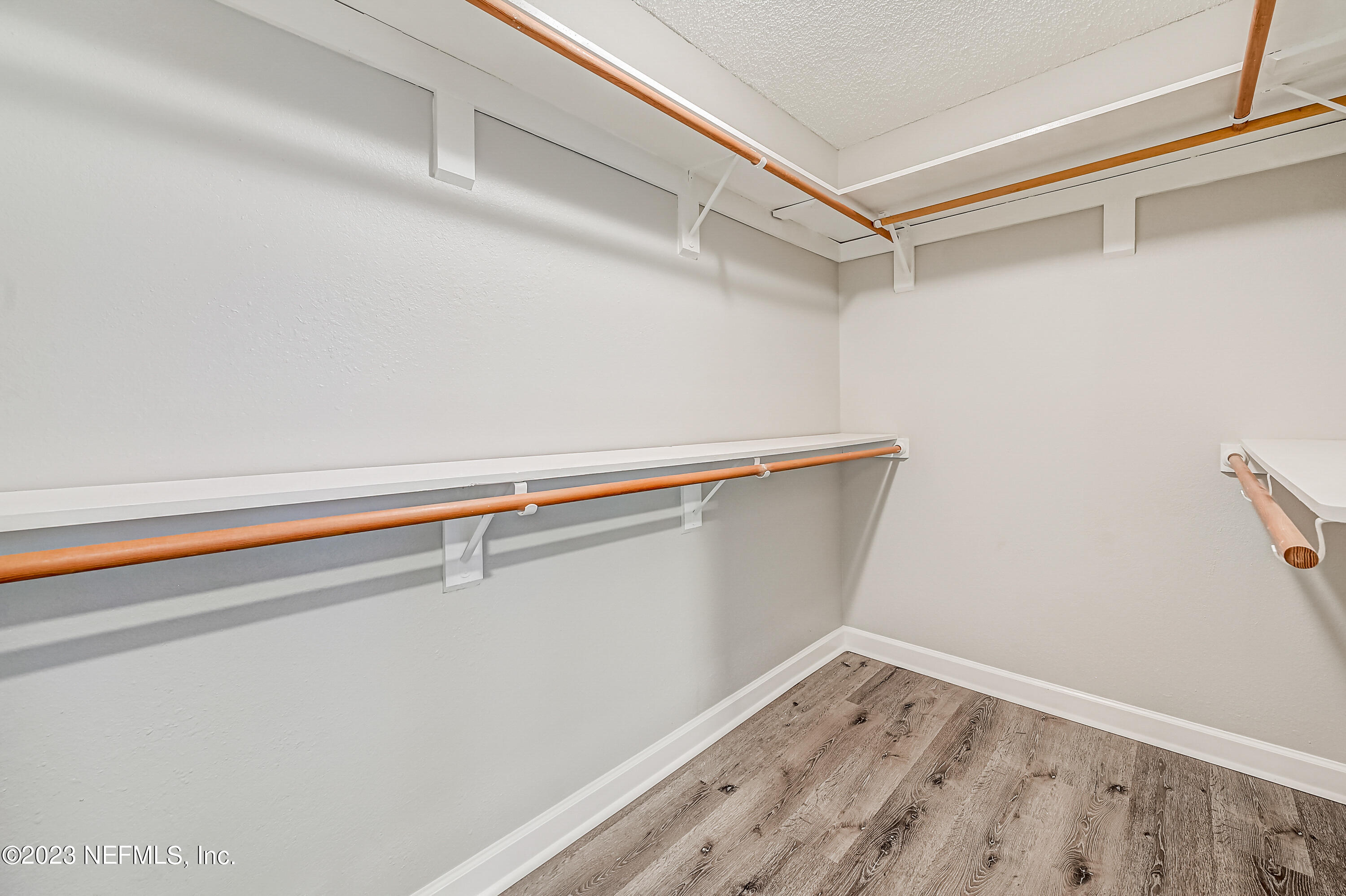 6105 Duke Road Jacksonville, FL 32217 - Photo 24 of 29 a view of small space with racks on the wall