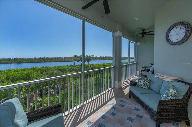a view of a roof deck with lake view and mountain view