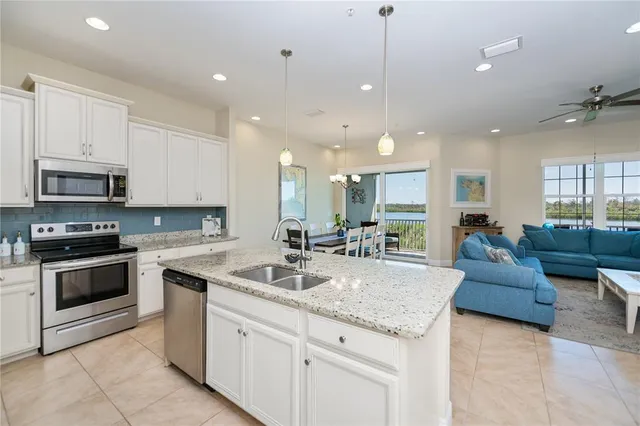 a bathroom with a tub and sink