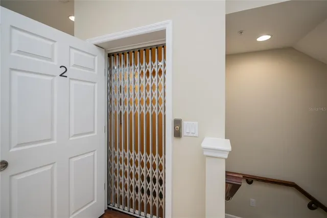 a bathroom with a granite countertop sink double and mirror