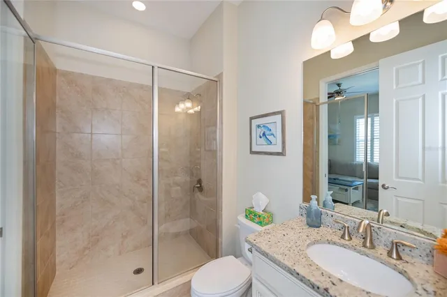 an aerial view of a house with a lake view