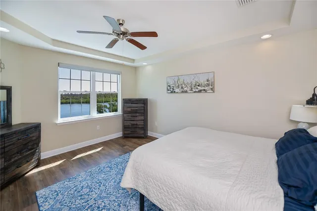 a outdoor space with patio fireplace couches and a fireplace with the potted plants