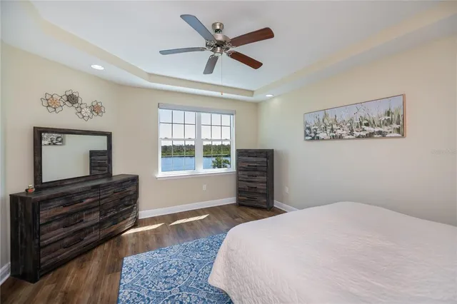 a living room with furniture a book shelf and a book shelf