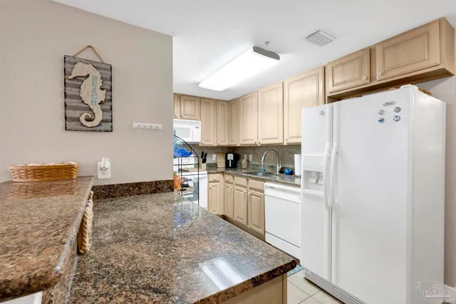 a room with a table and chairs