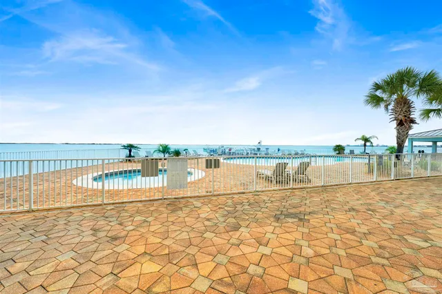 a lobby with a table and chairs