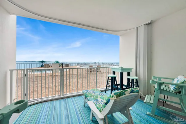 a view of swimming pool with seating