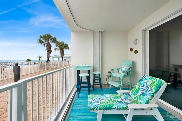 a lobby with furniture and a potted plant
