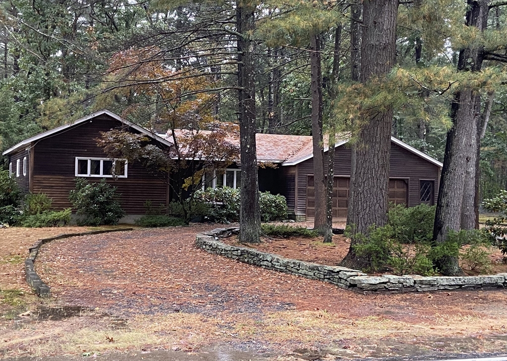 531 South Meadow Road Lancaster, MA 01523 - Photo 1 of 3 a front view of a house with a yard and tree s