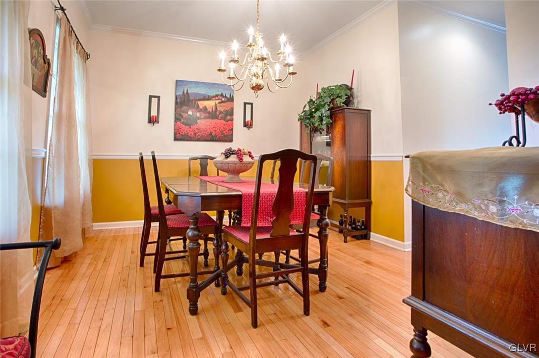 1068 Miller Road Wind Gap, PA 18091 - Photo 6 of 40 a view of a dining room with furniture and wooden floor