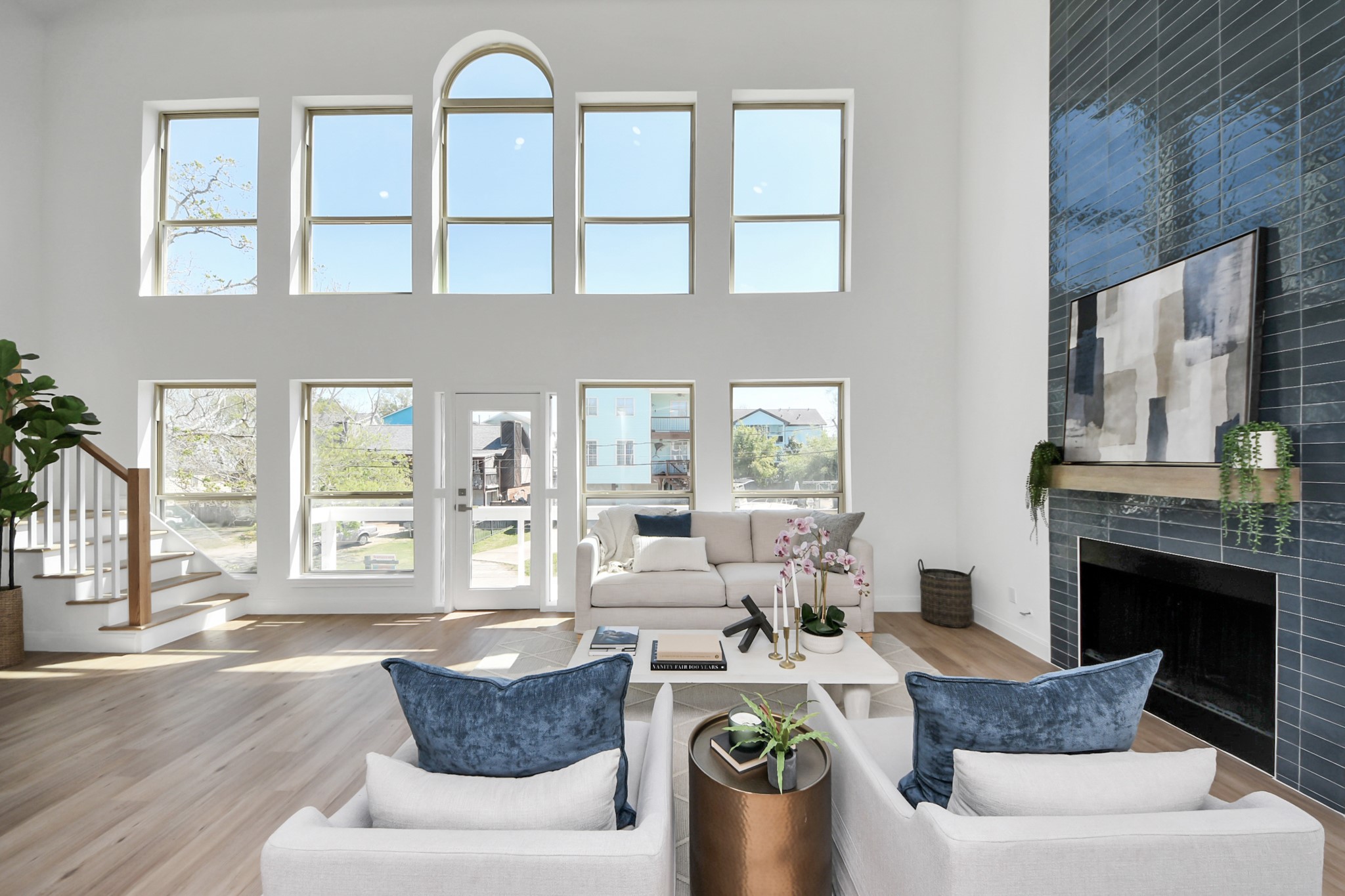 300 Narcissus Road Kemah, TX 77565 - Photo 11 of 47 a living room with furniture fireplace and a large window