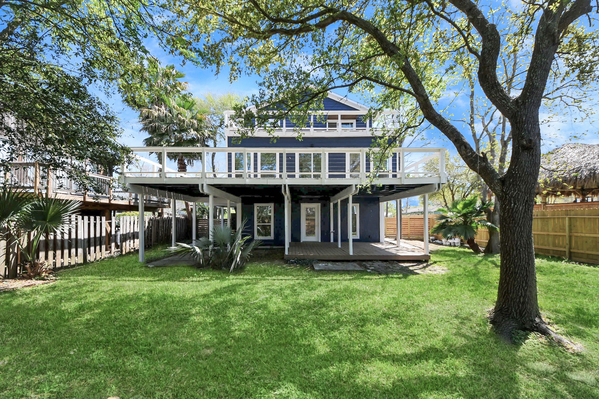 300 Narcissus Road Kemah, TX 77565 - Photo 40 of 47 a view of a house with a yard and sitting area