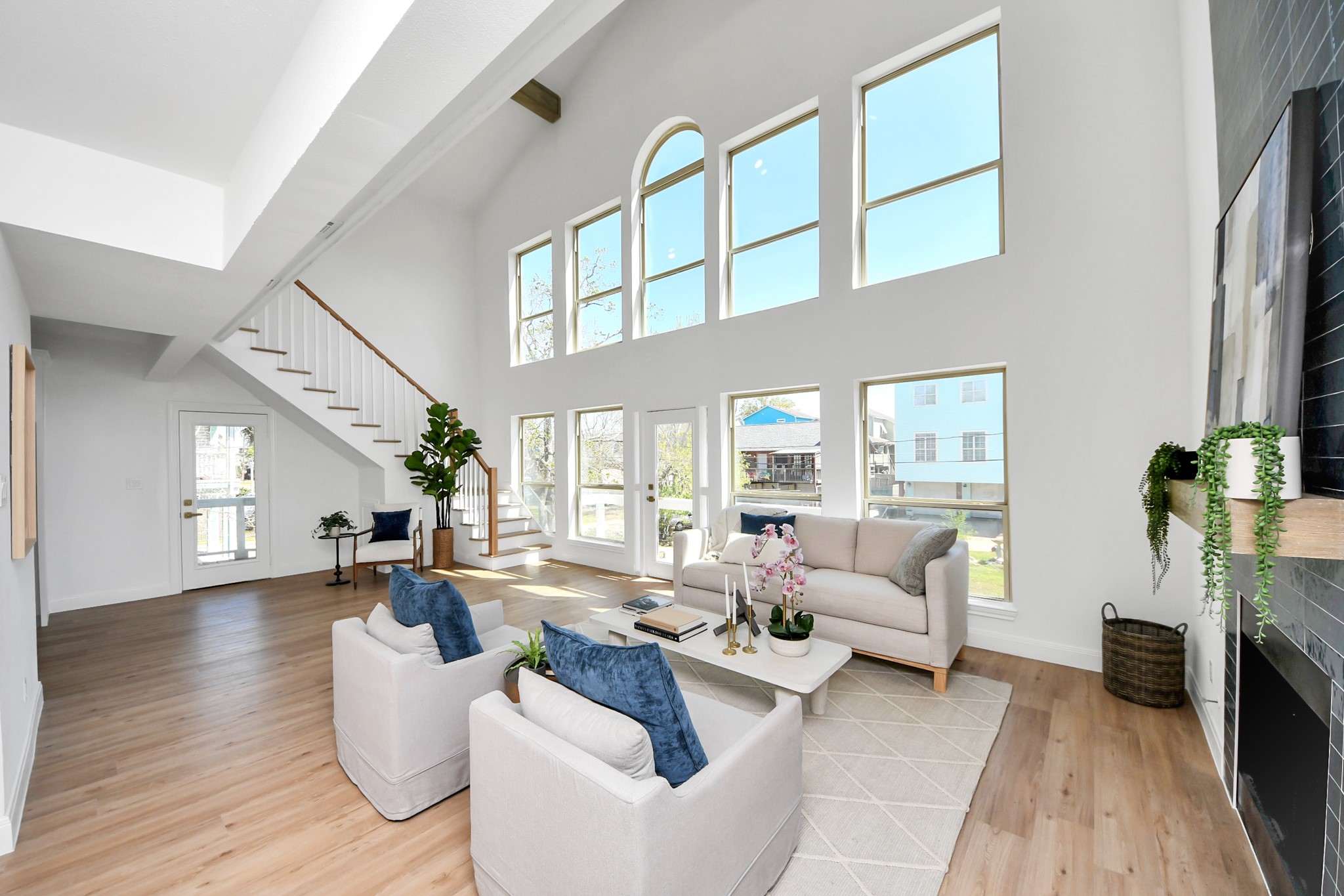 300 Narcissus Road Kemah, TX 77565 - Photo 5 of 47 a living room with furniture fireplace and a large window