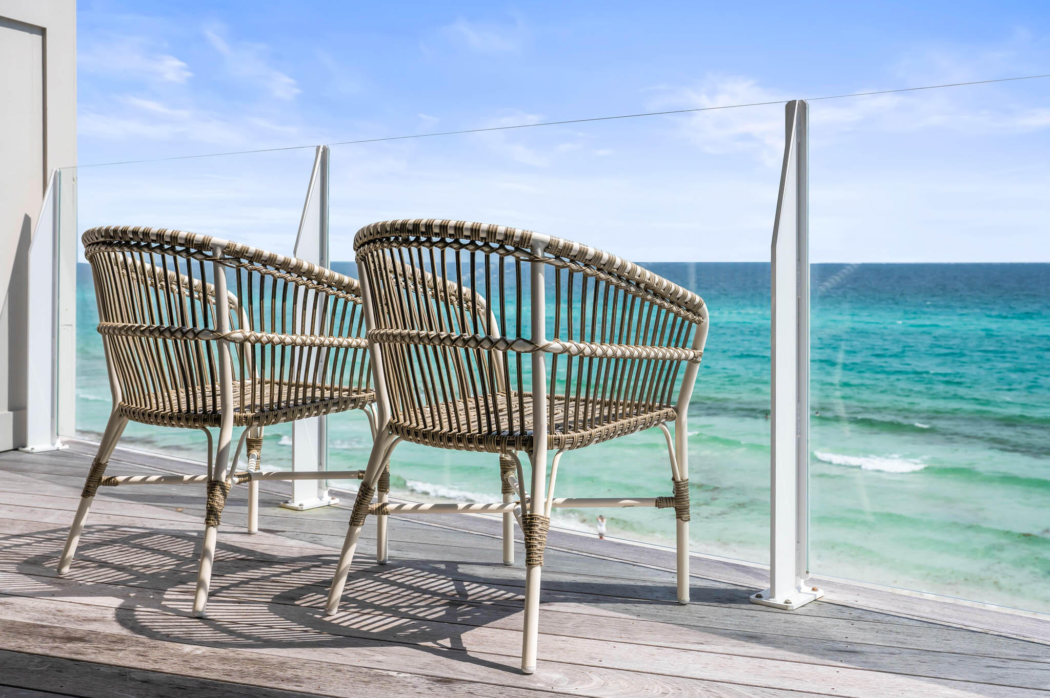 49 Hinton Drive, Unit 5 Santa Rosa Beach, FL 32459 - Photo 4 of 58 a view of a chair and table in the patio
