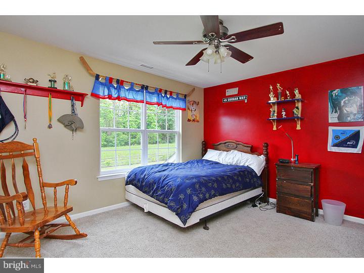 160 Prairie View Lane Mickleton, NJ 08056 - Photo 16 of 20 a bed room with a bed and a chair