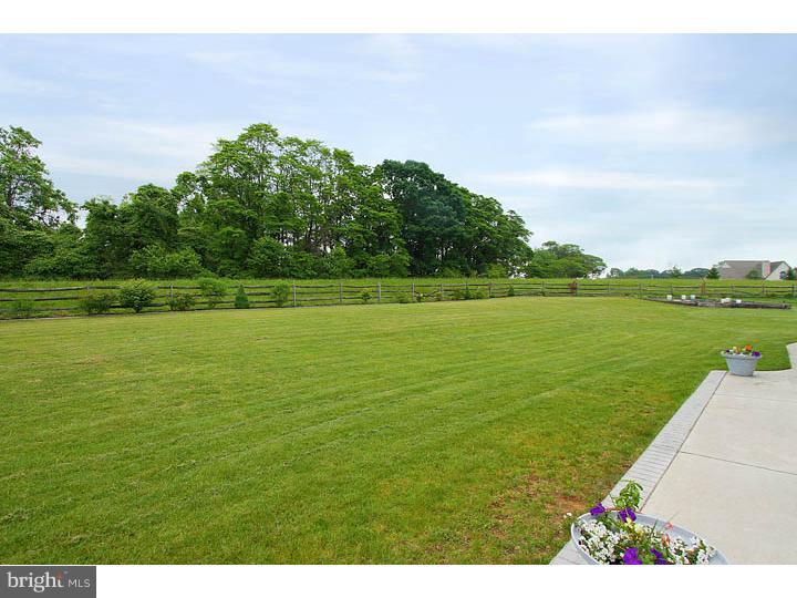 160 Prairie View Lane Mickleton, NJ 08056 - Photo 4 of 20 a view of a lake with a big yard