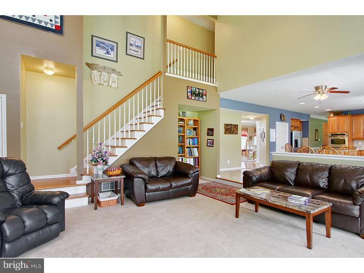 160 Prairie View Lane Mickleton, NJ 08056 - Photo 10 of 20 a living room with furniture and a rug