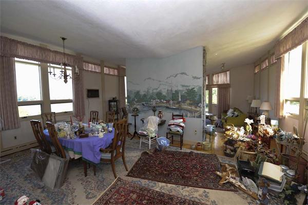 118 Forbes Road Milton, MA 02186 - Photo 7 of 10 a living room with furniture and a large window
