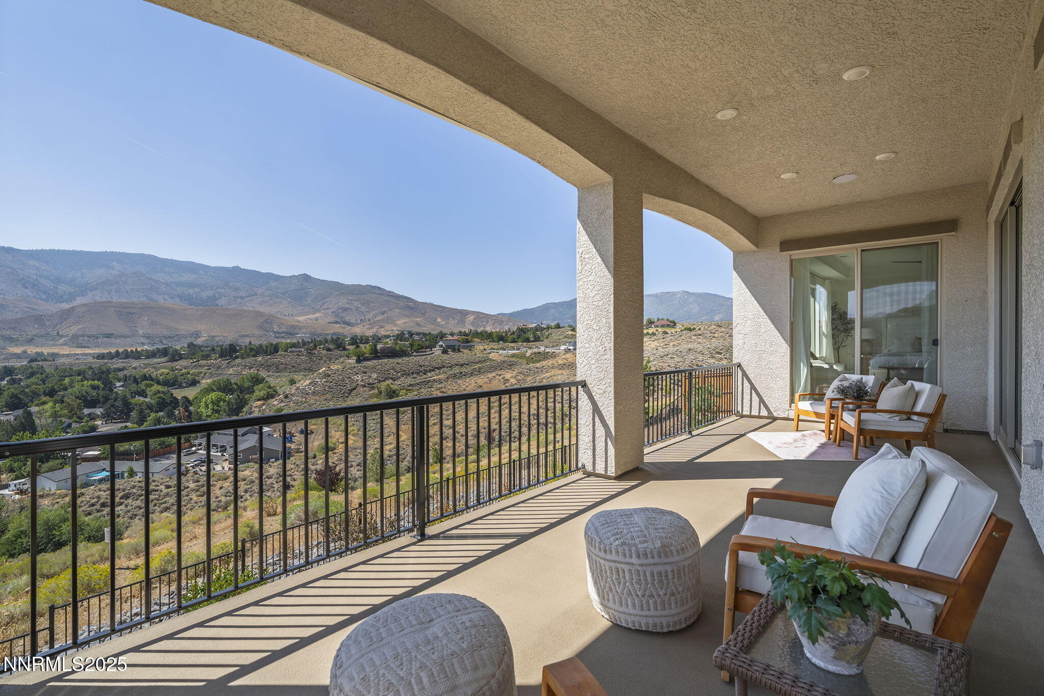 480 Gooseberry Drive Reno, NV 89523 - Photo 16 of 48 a balcony with furniture and a potted plant