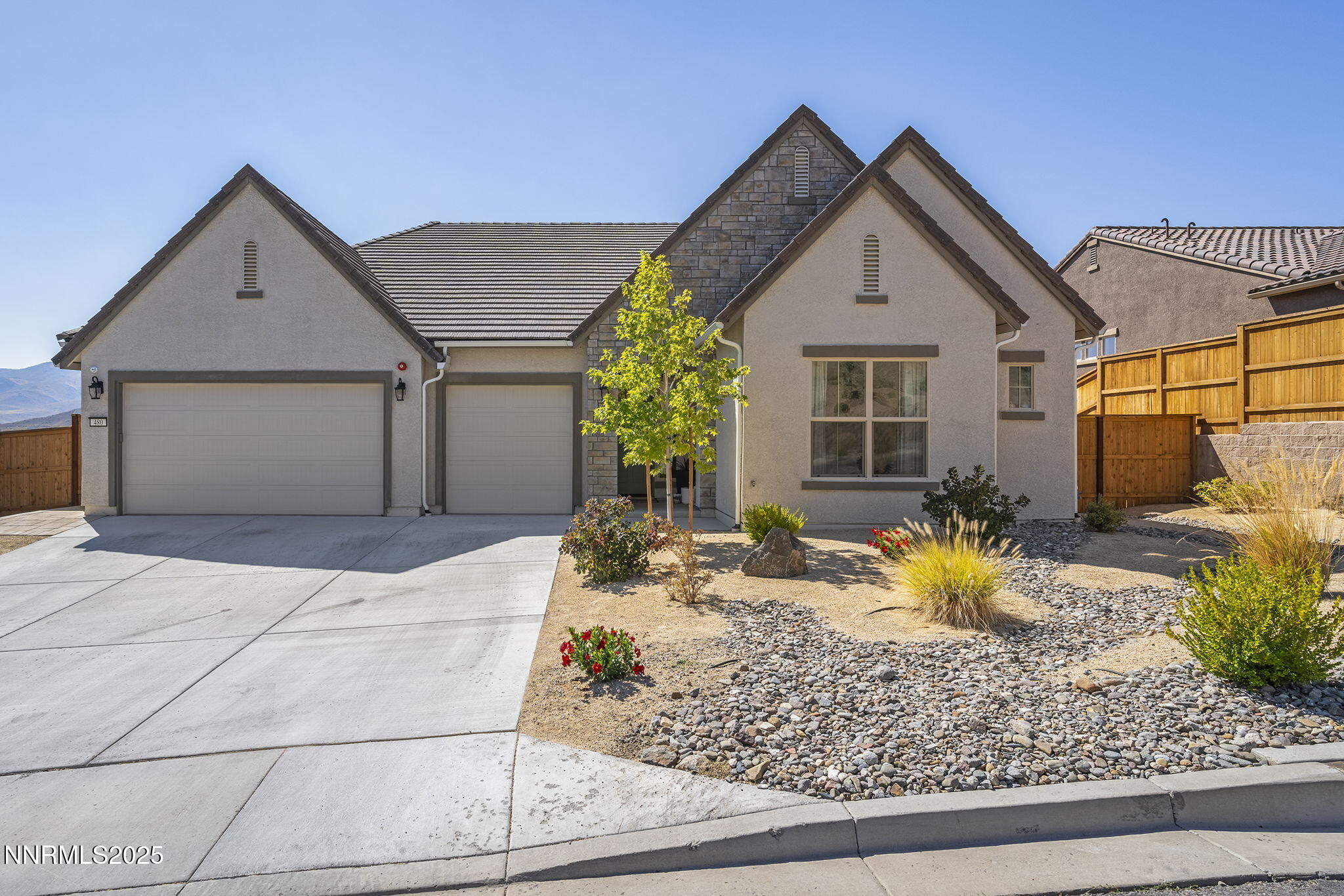 480 Gooseberry Drive Reno, NV 89523 - Photo 2 of 48 a front view of a house with garden