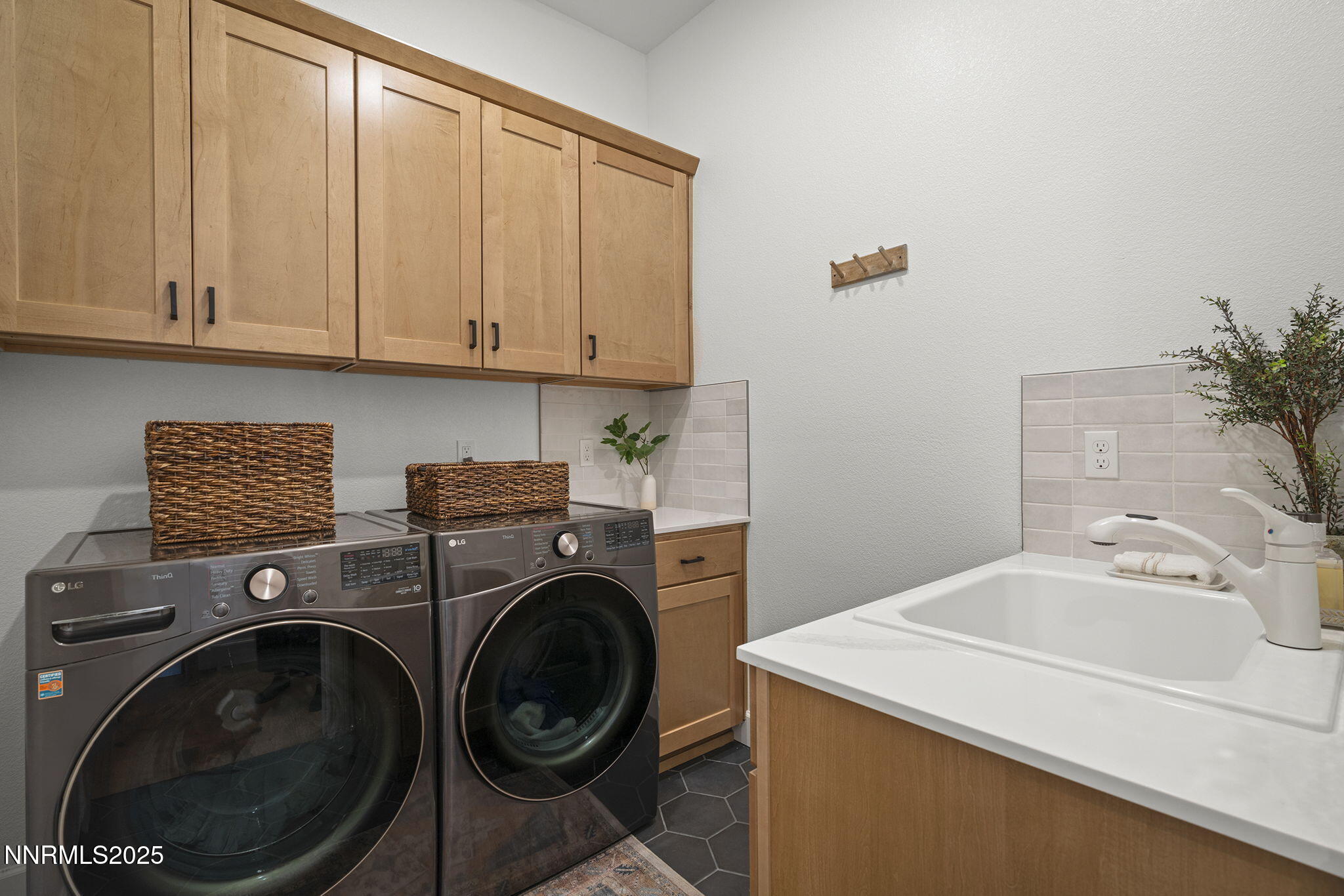 480 Gooseberry Drive Reno, NV 89523 - Photo 31 of 48 a utility room with sink dryer and washer