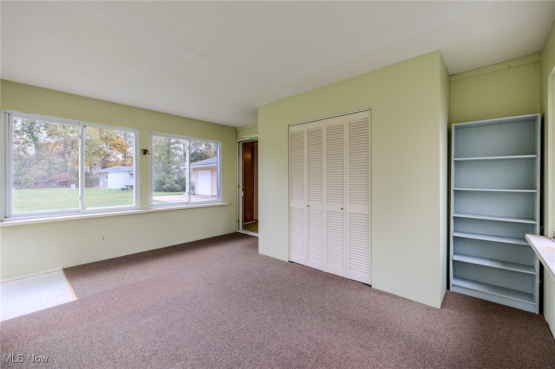8226 Cedar Road Chesterland, OH 44026 - Photo 32 of 46 Unfurnished bedroom with carpet floors and a closet