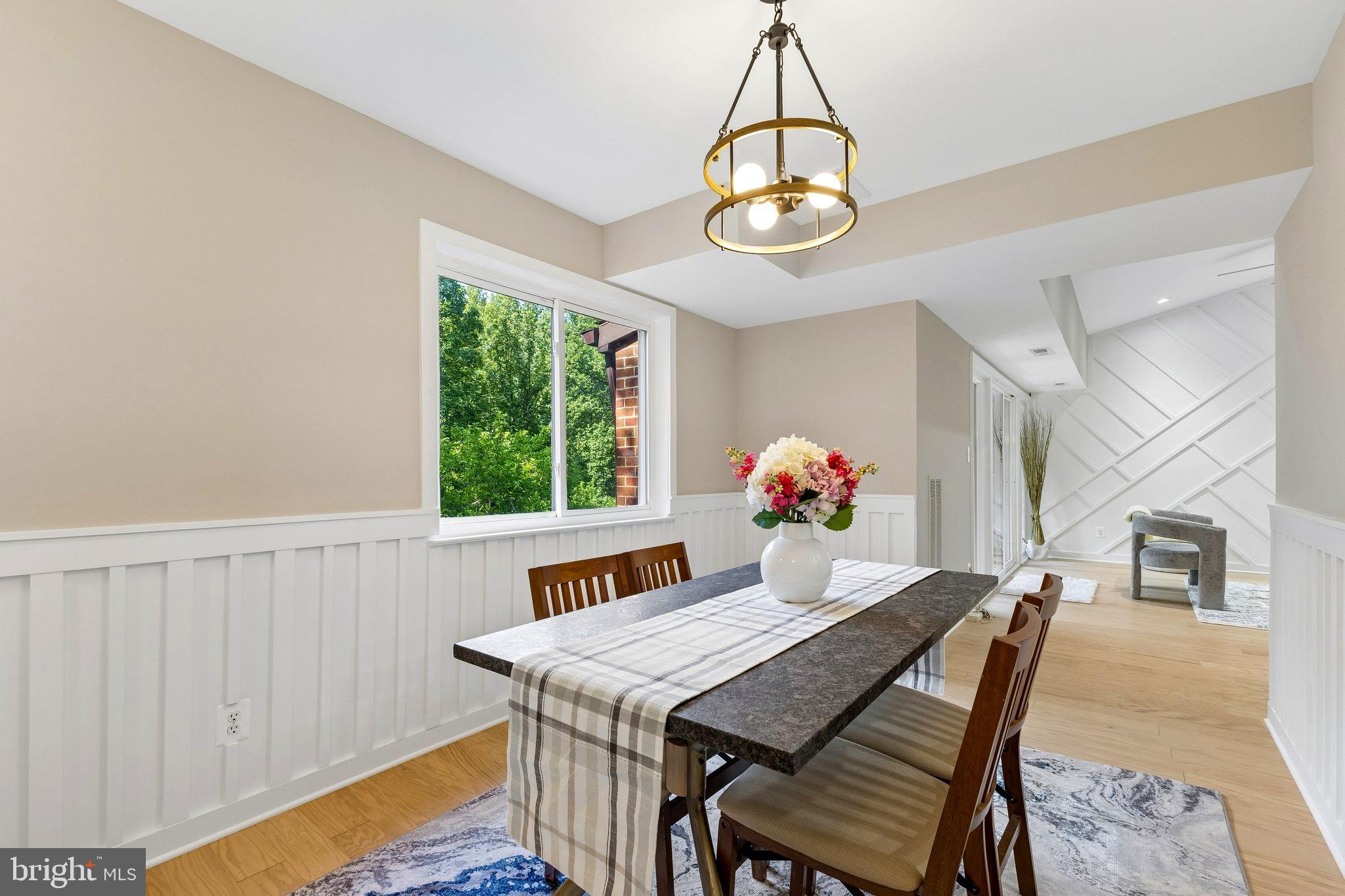 11841 Shire Court, Unit 31D Reston, VA 20191 - Photo 10 of 24 a view of a dining room with furniture window and outside view