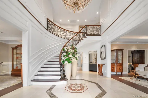 a view of an entryway with a front door