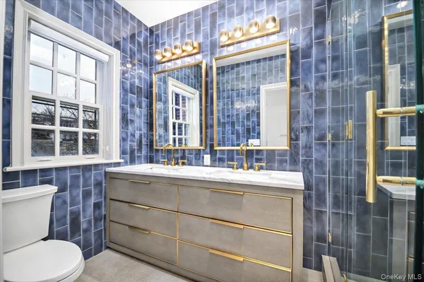 a bathroom with a sink and a toilet