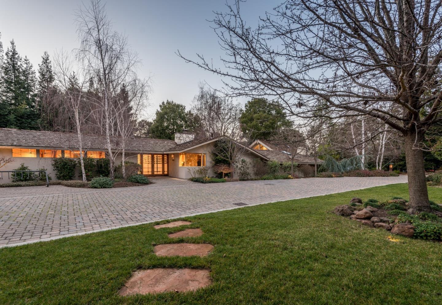 11525 Old Ranch Lane Los Altos Hills, CA 94024 - Photo 1 of 17 a front view of a house with a yard and trees