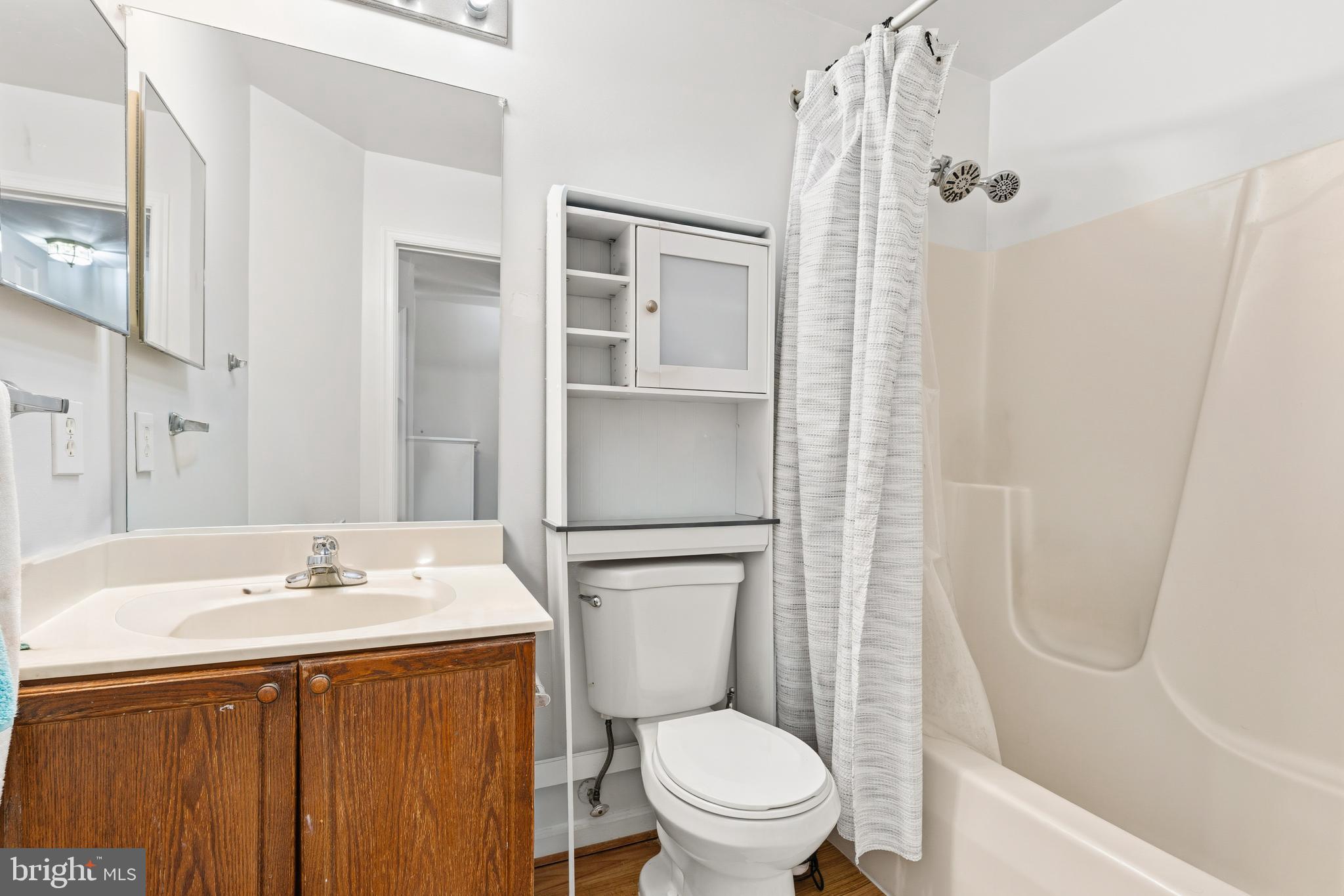 137 Harpers Way Frederick, MD 21702 - Photo 18 of 28 a bathroom with a sink a toilet and shower