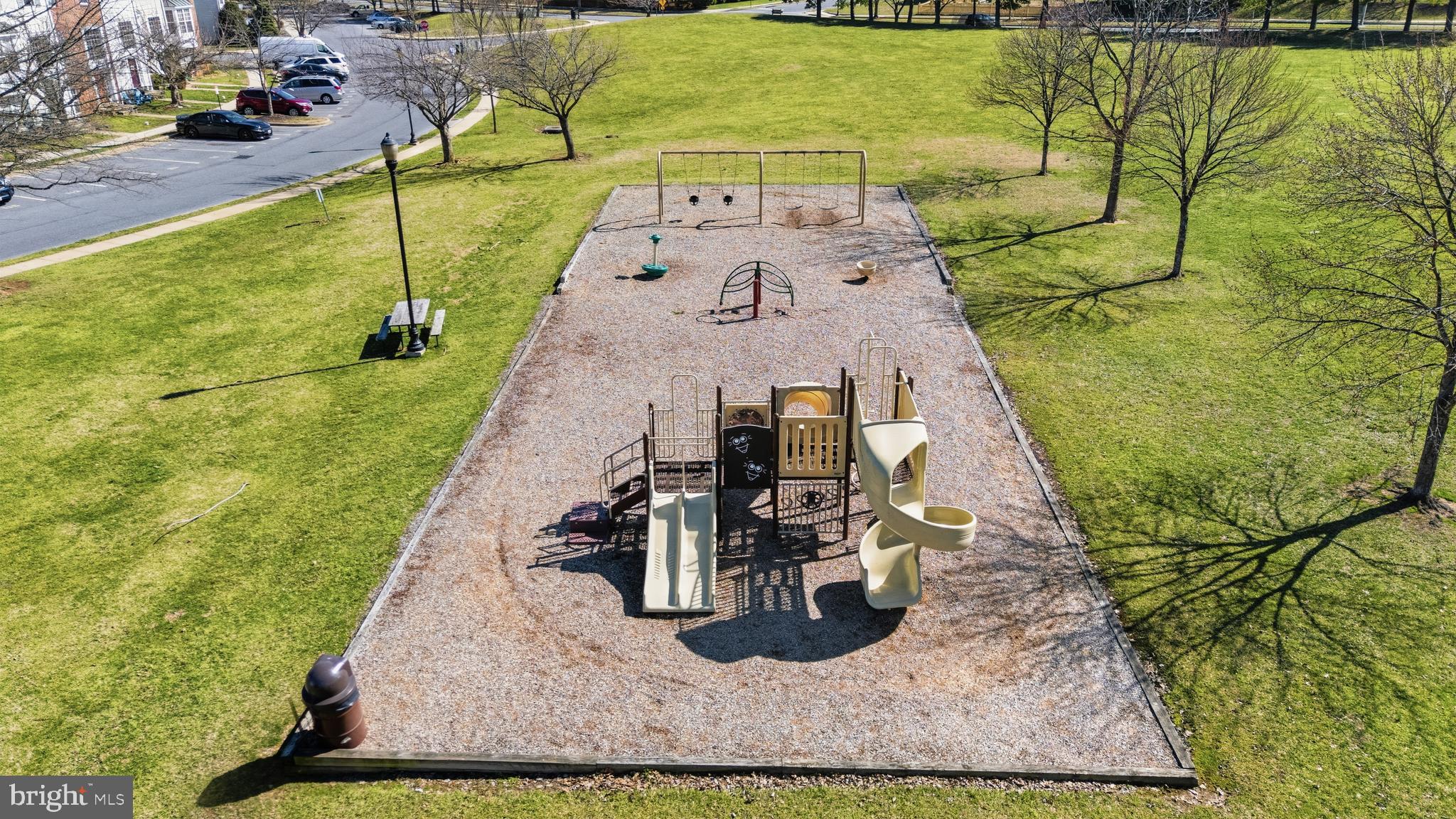 137 Harpers Way Frederick, MD 21702 - Photo 24 of 28 swimming pool view with a garden