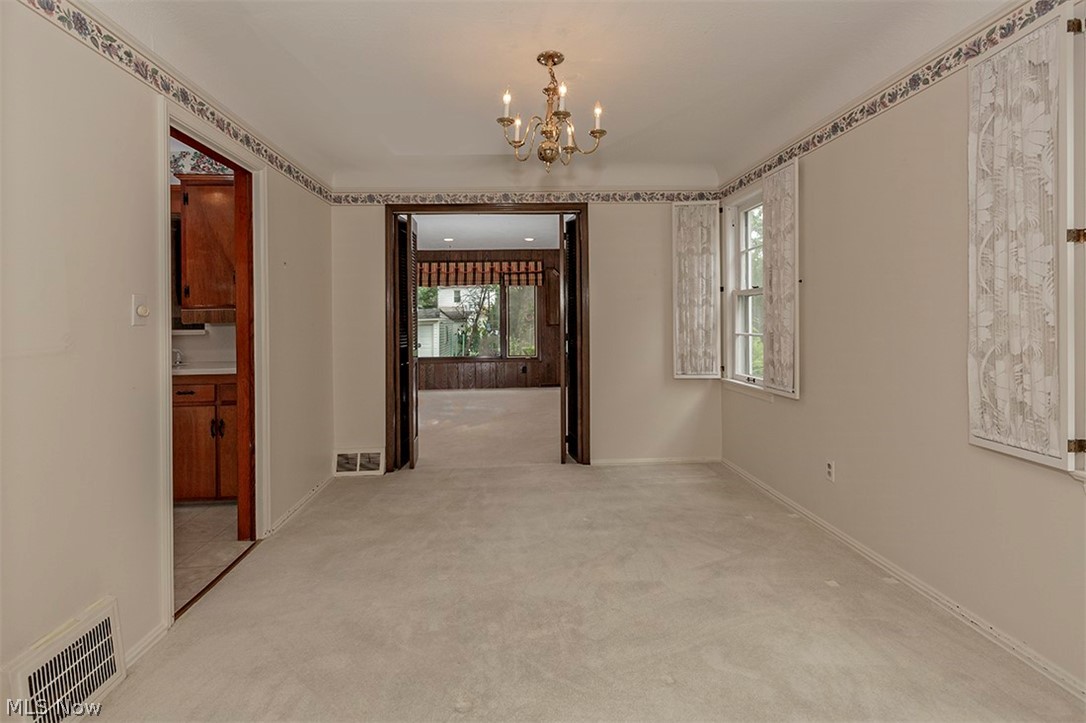4053 Bayard Road Cleveland, OH 44121 - Photo 9 of 35 Dining room with view into expansive family room.