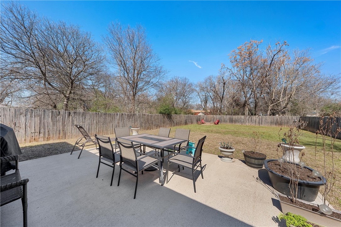 1206 Spring Street Waco, TX 76704 - Photo 23 of 33 a view of a lake with table and chairs