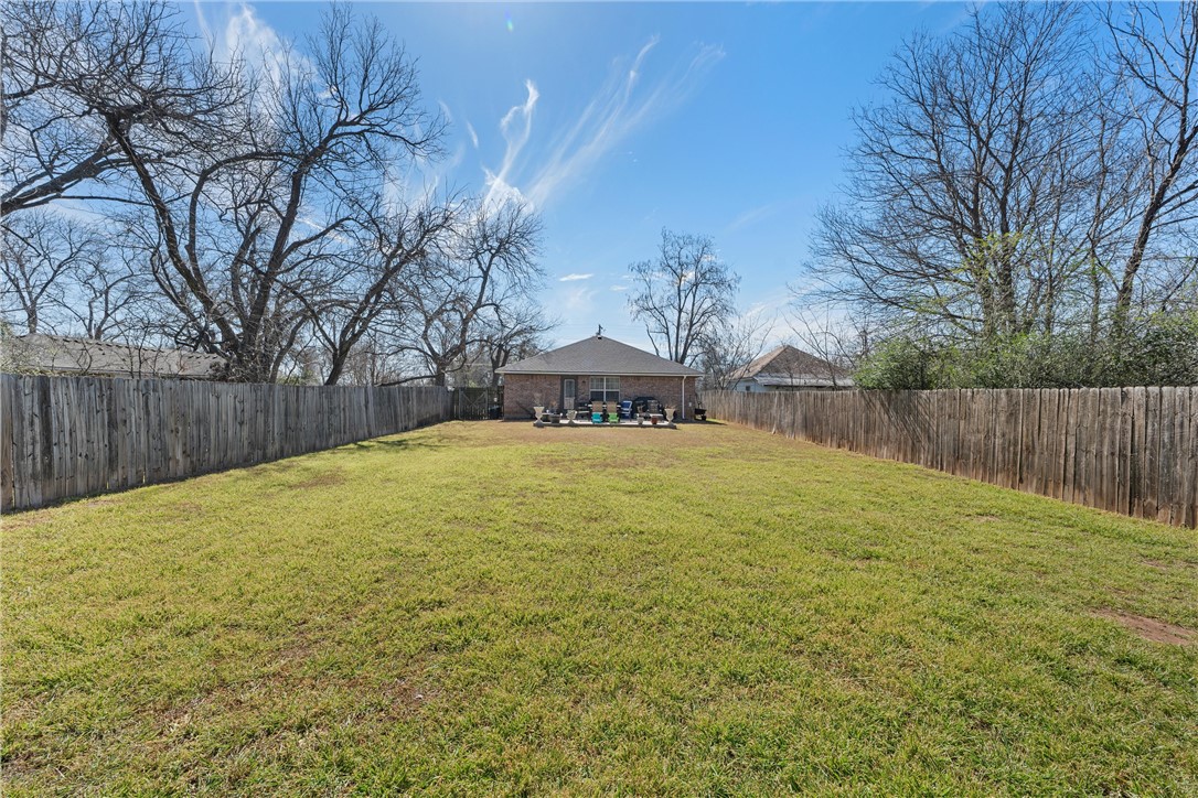 1206 Spring Street Waco, TX 76704 - Photo 26 of 33 a house with swimming pool in front of it