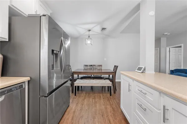 a kitchen that has a cabinets and a stove